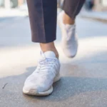 walking a man with shoe